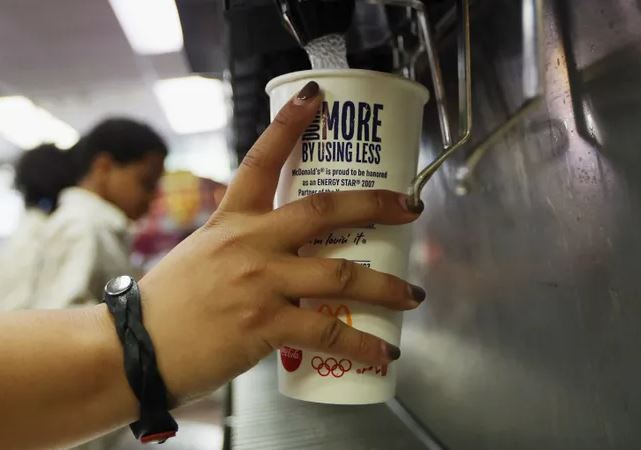 Soda at fast food restaurant being distributed